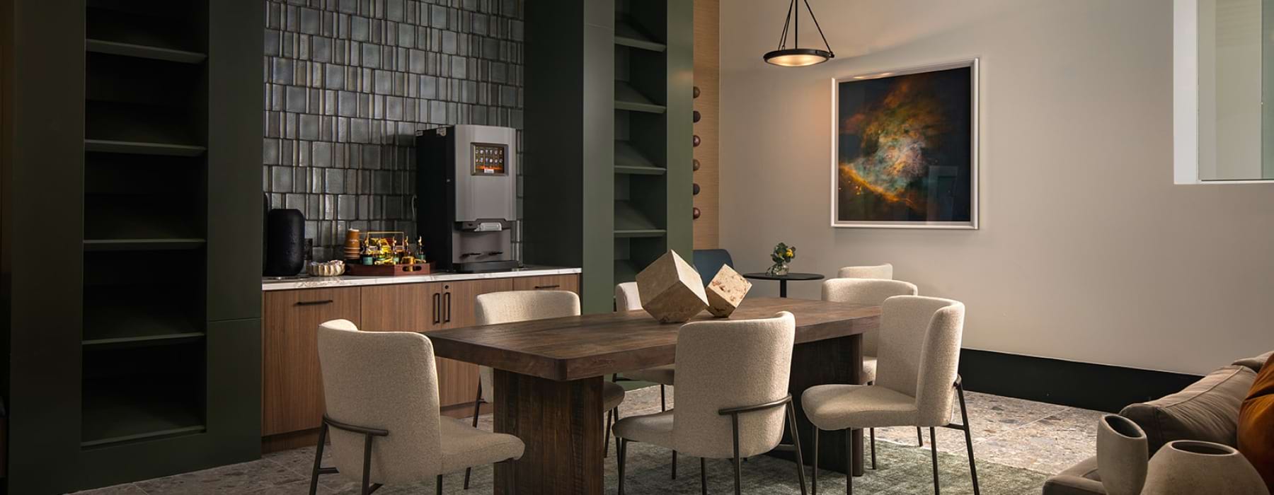 table with chairs and coffee maker