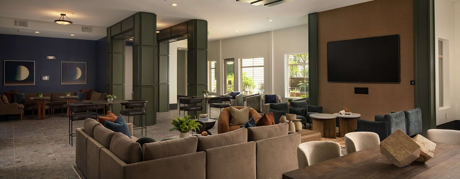 couch with tv and chairs