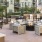 a patio with tables and chairs